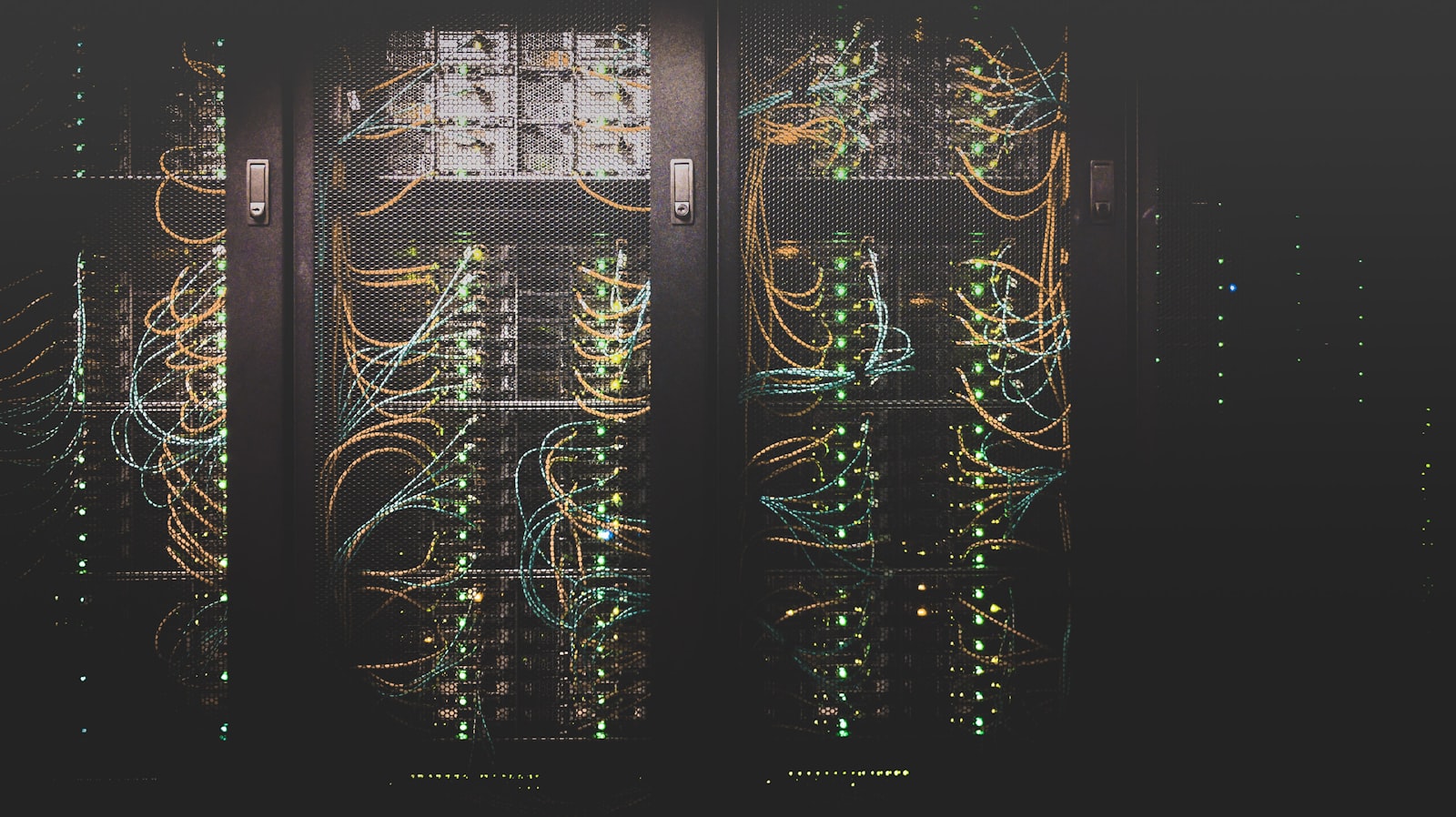 A modern data hall lit in cool blue